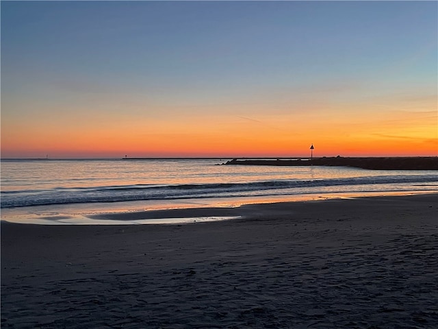 view of water feature with a beach view