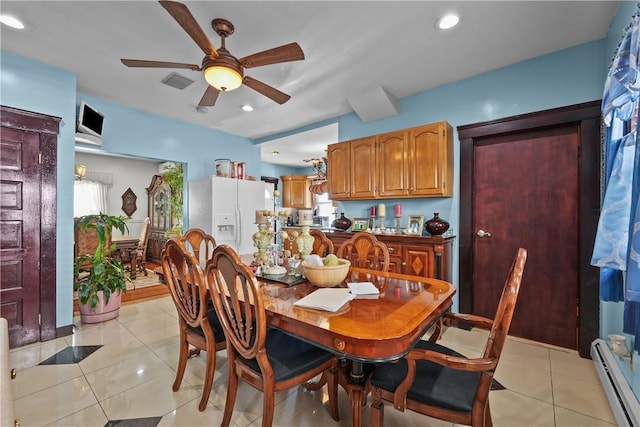 dining space featuring a baseboard heating unit, recessed lighting, visible vents, and light tile patterned flooring