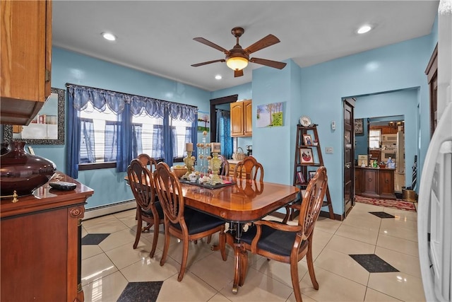 dining space featuring a baseboard heating unit, recessed lighting, light tile patterned flooring, and a ceiling fan