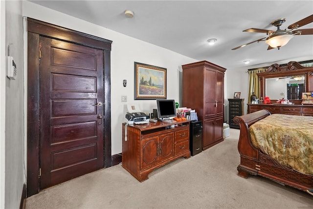 bedroom featuring light colored carpet