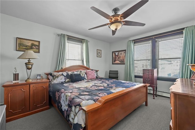 bedroom with a baseboard heating unit, light carpet, and ceiling fan