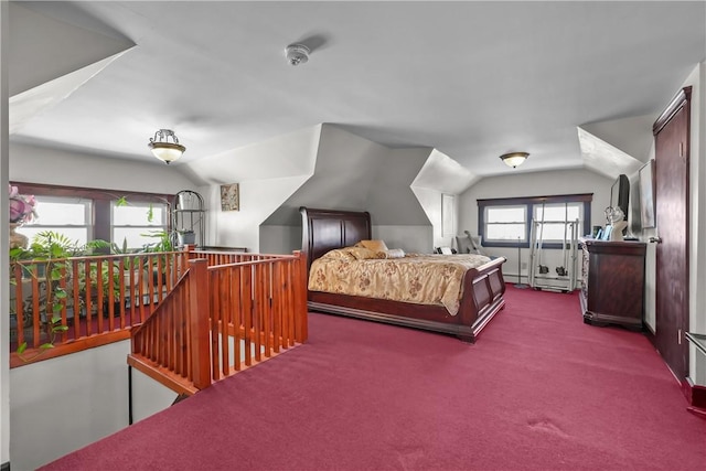 carpeted bedroom featuring vaulted ceiling