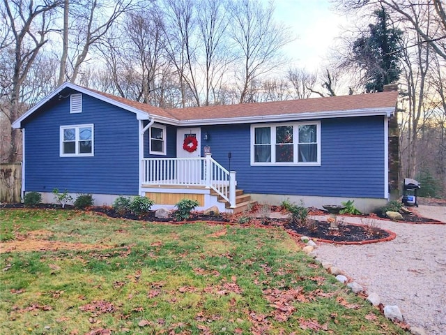 single story home featuring a front yard