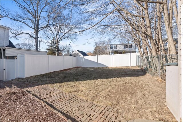 view of yard featuring a fenced backyard