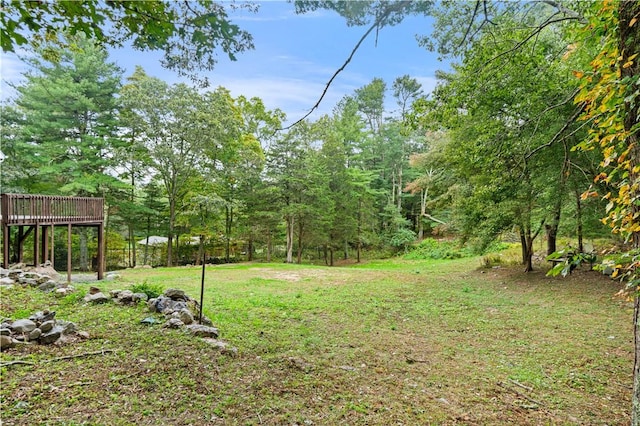 view of yard featuring a deck