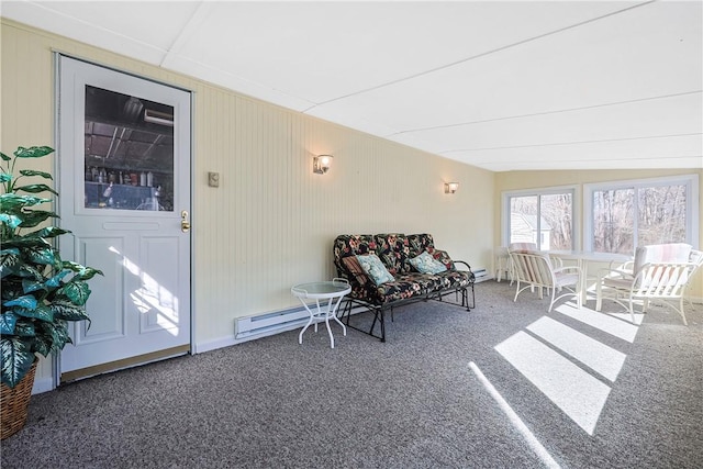 sunroom with a baseboard heating unit