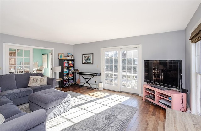 living area featuring hardwood / wood-style floors