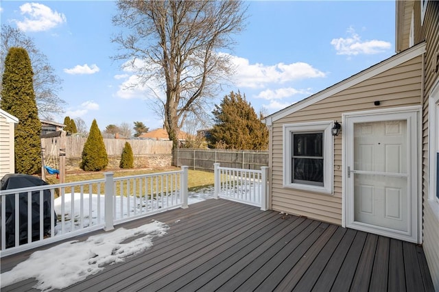 wooden deck featuring fence