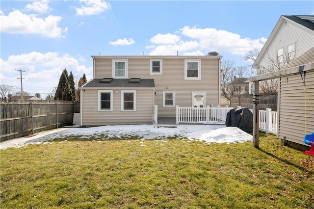 back of house with a patio, fence, and a lawn