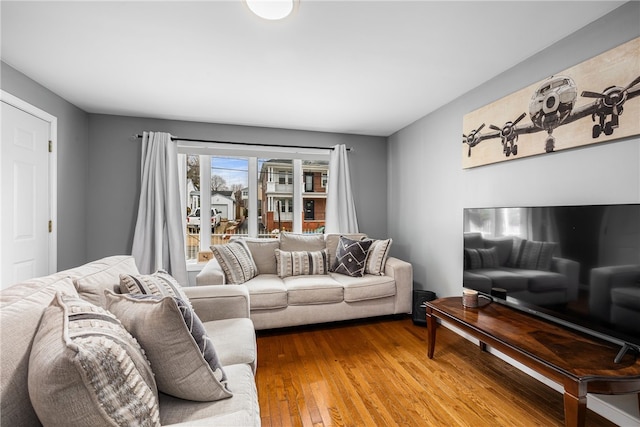 living area with wood finished floors