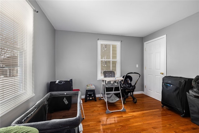 office with wood finished floors and baseboards