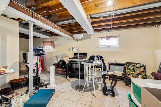 workout room with light tile patterned floors