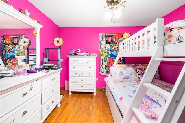 bedroom featuring light wood-style flooring