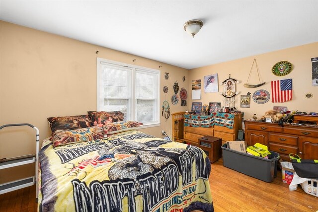 bedroom featuring light wood-type flooring