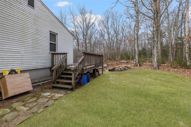 view of yard featuring a deck