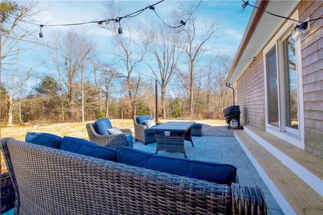 view of patio featuring an outdoor hangout area and grilling area