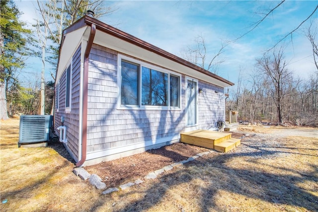 view of property exterior featuring central AC