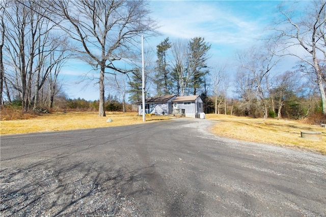 view of road featuring aphalt driveway