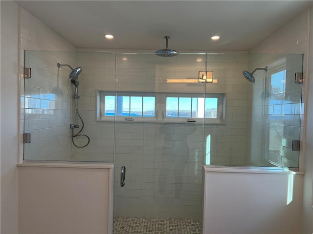 full bathroom featuring recessed lighting and a stall shower