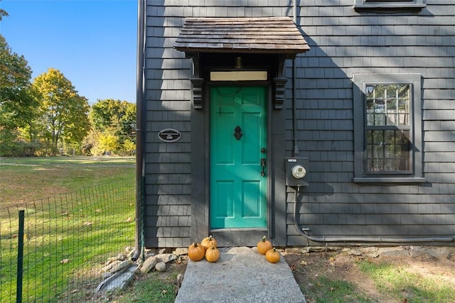 property entrance featuring fence