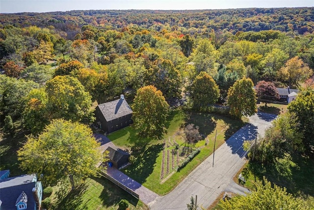 aerial view with a wooded view