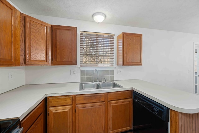 kitchen with black dishwasher, light countertops, a sink, and electric range