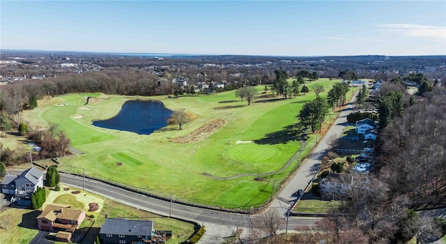 birds eye view of property featuring a water view and golf course view