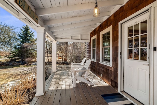 wooden deck featuring a porch