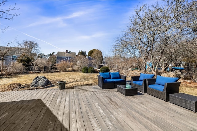 wooden deck featuring an outdoor hangout area