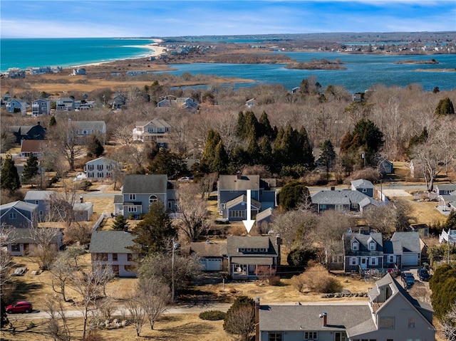 bird's eye view with a water view and a residential view