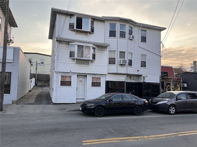 view of front of home featuring cooling unit