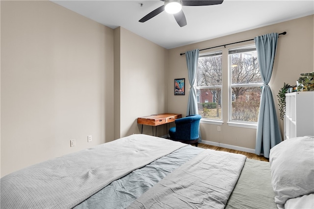 1000 Providence Pl Unit 106, Providence, RI 02903 - bedroom with baseboards, ceiling fan, and wood finished floors
