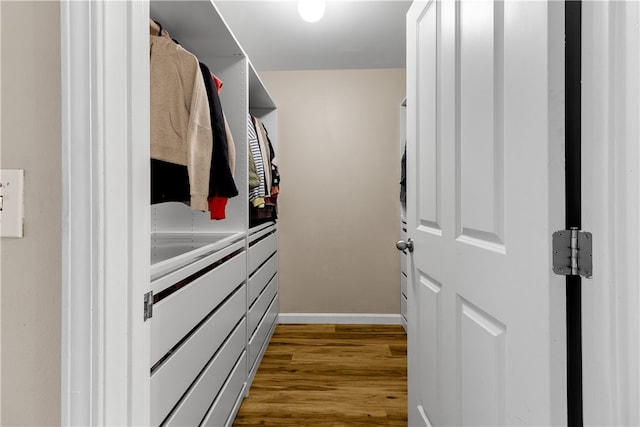 spacious closet with wood finished floors