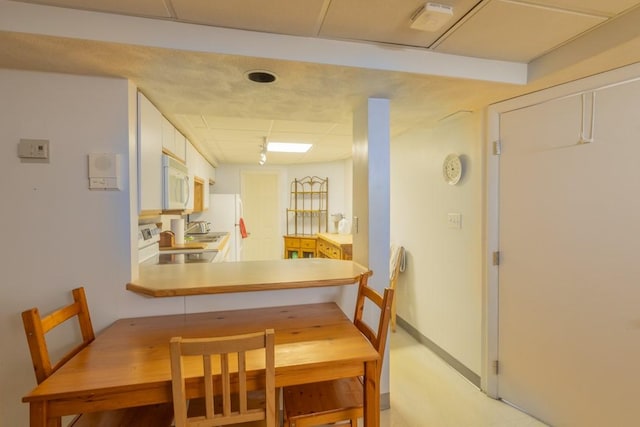 dining area with baseboards