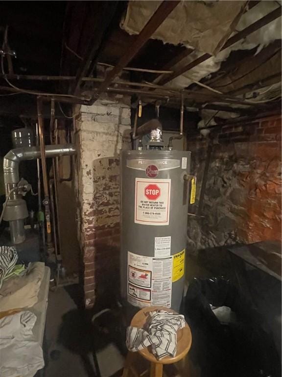 utility room with gas water heater