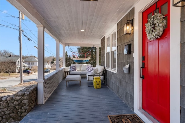 wooden deck featuring a porch