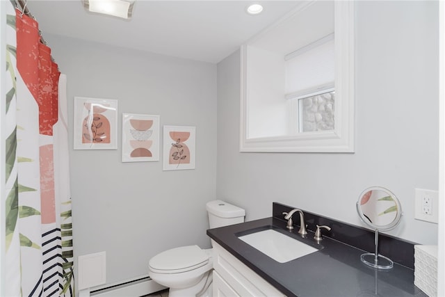 full bathroom featuring baseboard heating, a shower with shower curtain, vanity, and toilet