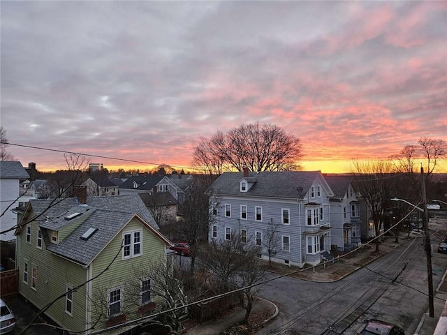 aerial view at dusk with a residential view