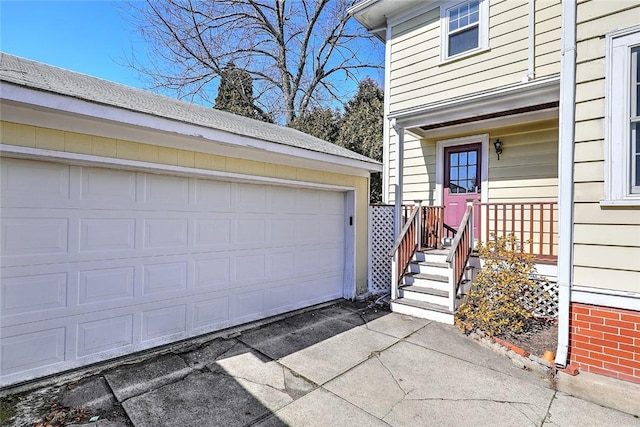 garage with driveway