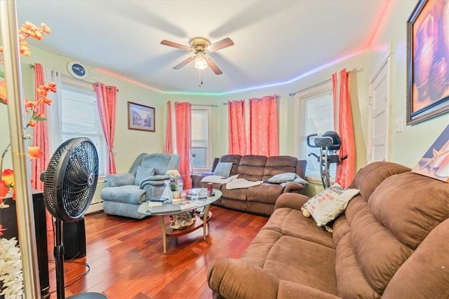 living room featuring ceiling fan and wood finished floors