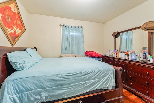 bedroom featuring wood finished floors