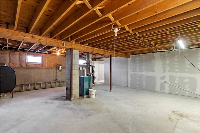 basement featuring heating fuel and a heating unit