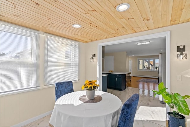 dining space featuring wood ceiling and recessed lighting