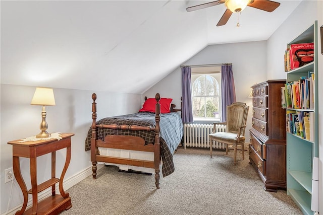 carpeted bedroom with lofted ceiling, ceiling fan, radiator heating unit, and baseboards