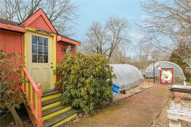 view of greenhouse featuring entry steps