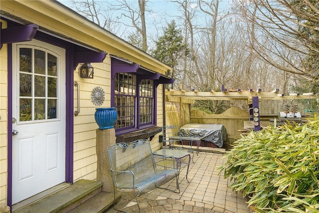 view of patio with fence