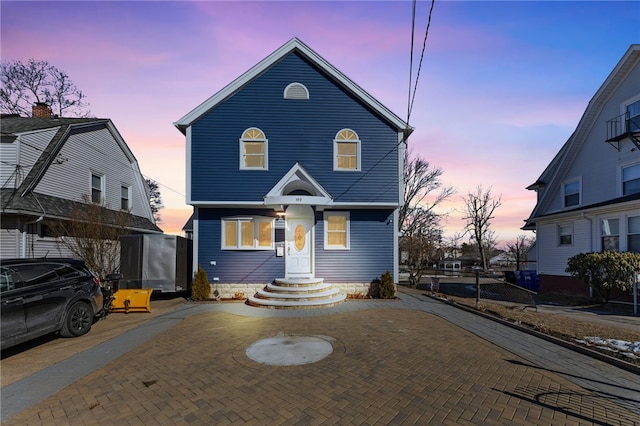 view of front of house featuring decorative driveway