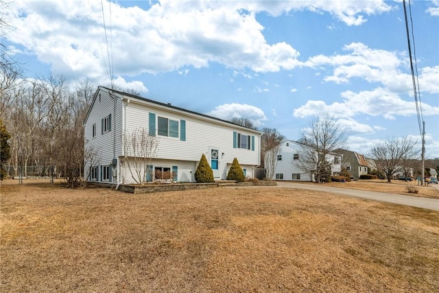 bi-level home with a front yard