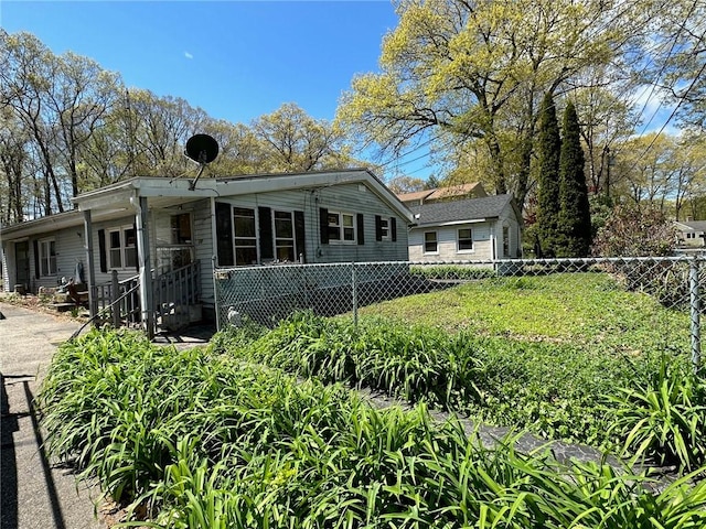 view of front of home with fence