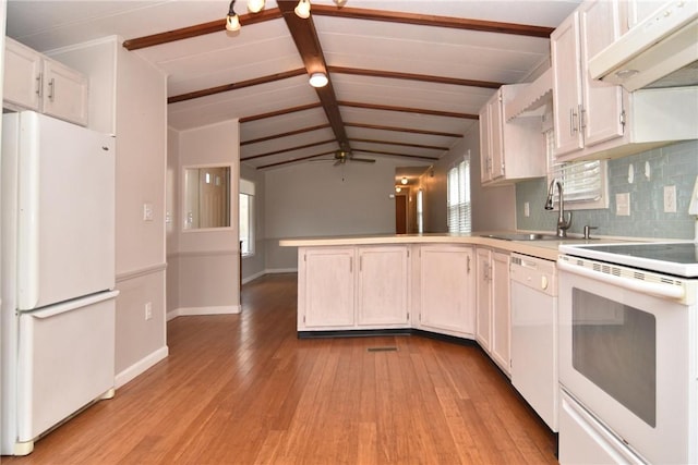 kitchen with lofted ceiling with beams, a sink, light wood-type flooring, white appliances, and under cabinet range hood